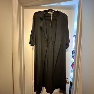 Black polyester long buttoned up sleeve vest